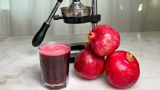 Fresh squeezed Pomegranate juice with a Hand Press [upl. by Lahcsap]