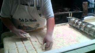 Beignets being made at Cafe Du Monde in New Orleans LA [upl. by Dever322]